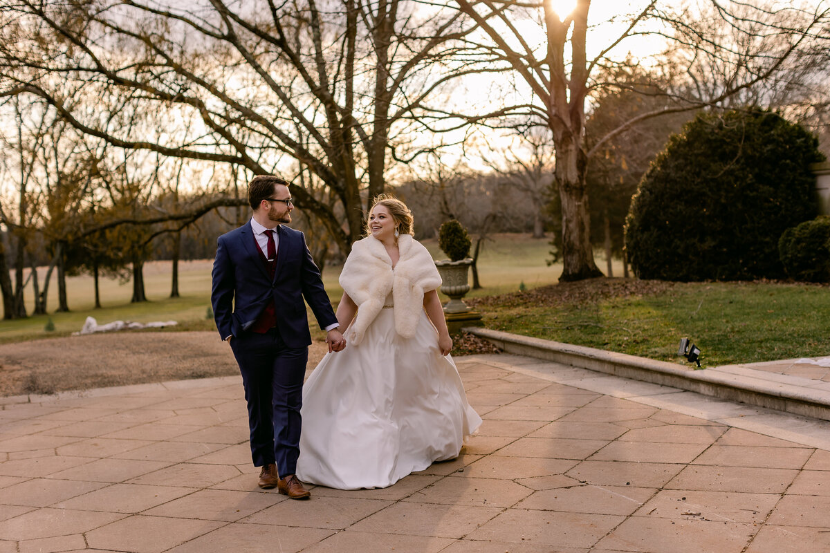 Wedding Photographer, couple holding hands and walking