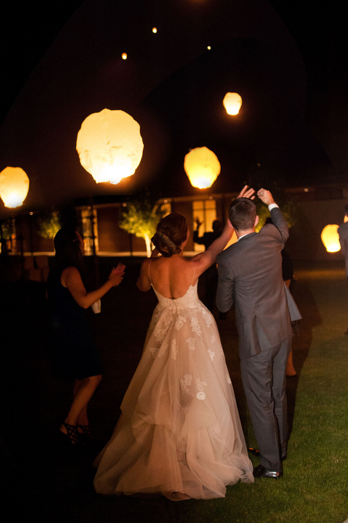 sky lanterns at ponzi vineyard wedding