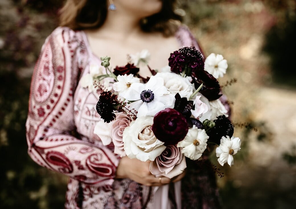 Wedding florals with deep burgundy and dusty rose flowers. Unique bridal bouquets. Artistic floral design by The Garden Studio LLC, an Easton, MD florist.
