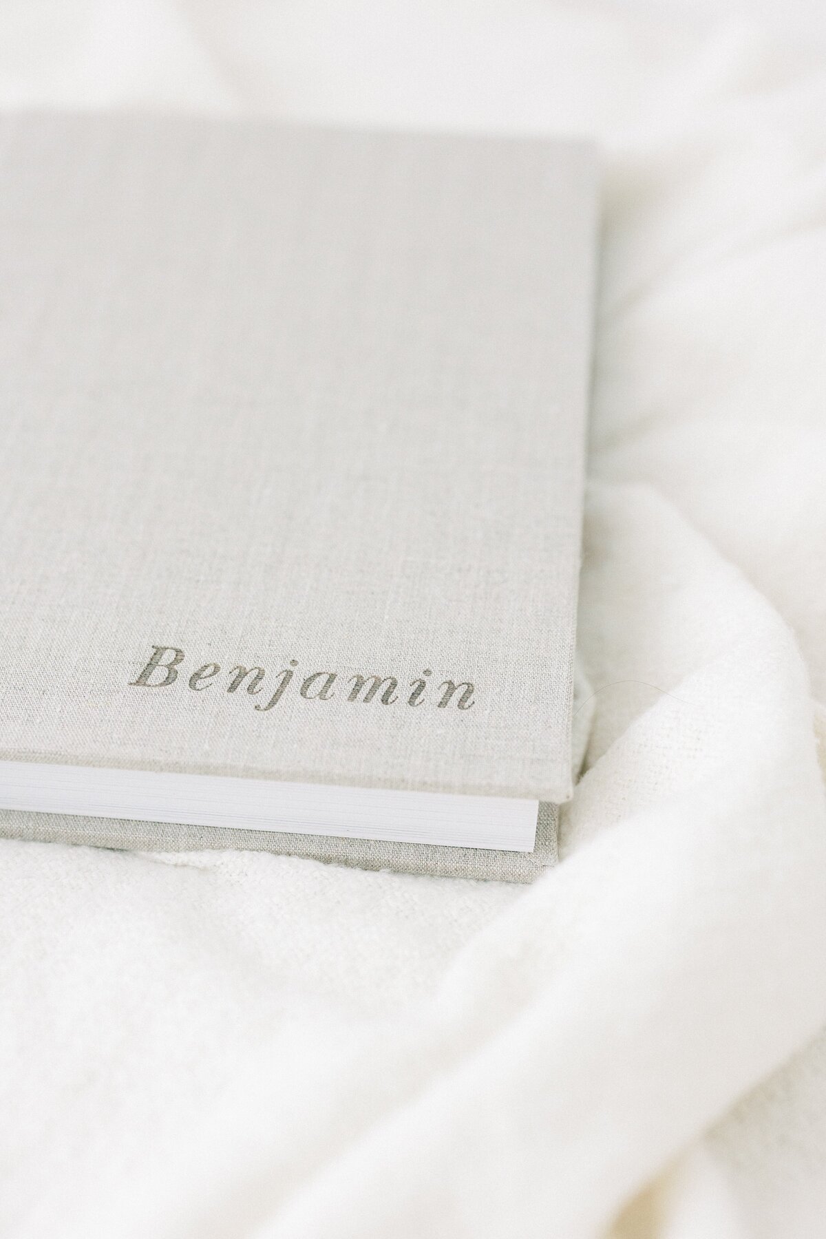 Redtree customized grey heirloom album with name benjamin on front cover