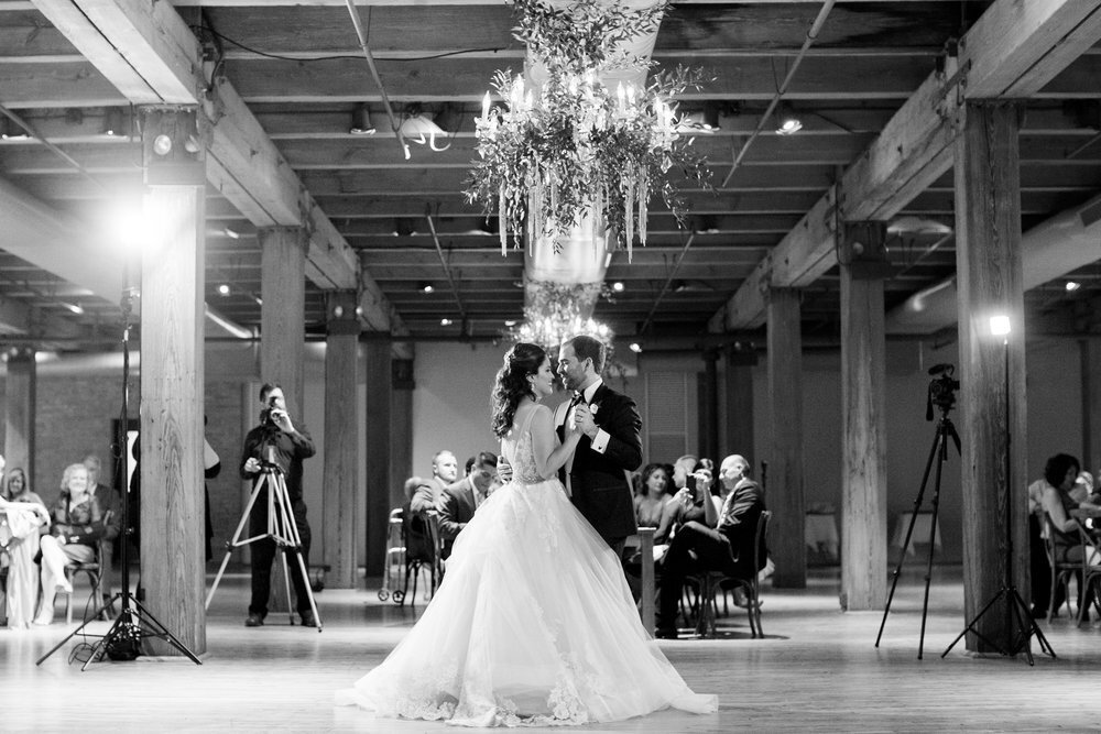 bride and groom dance their first dance at the Bridgeport Art Center in Chicago