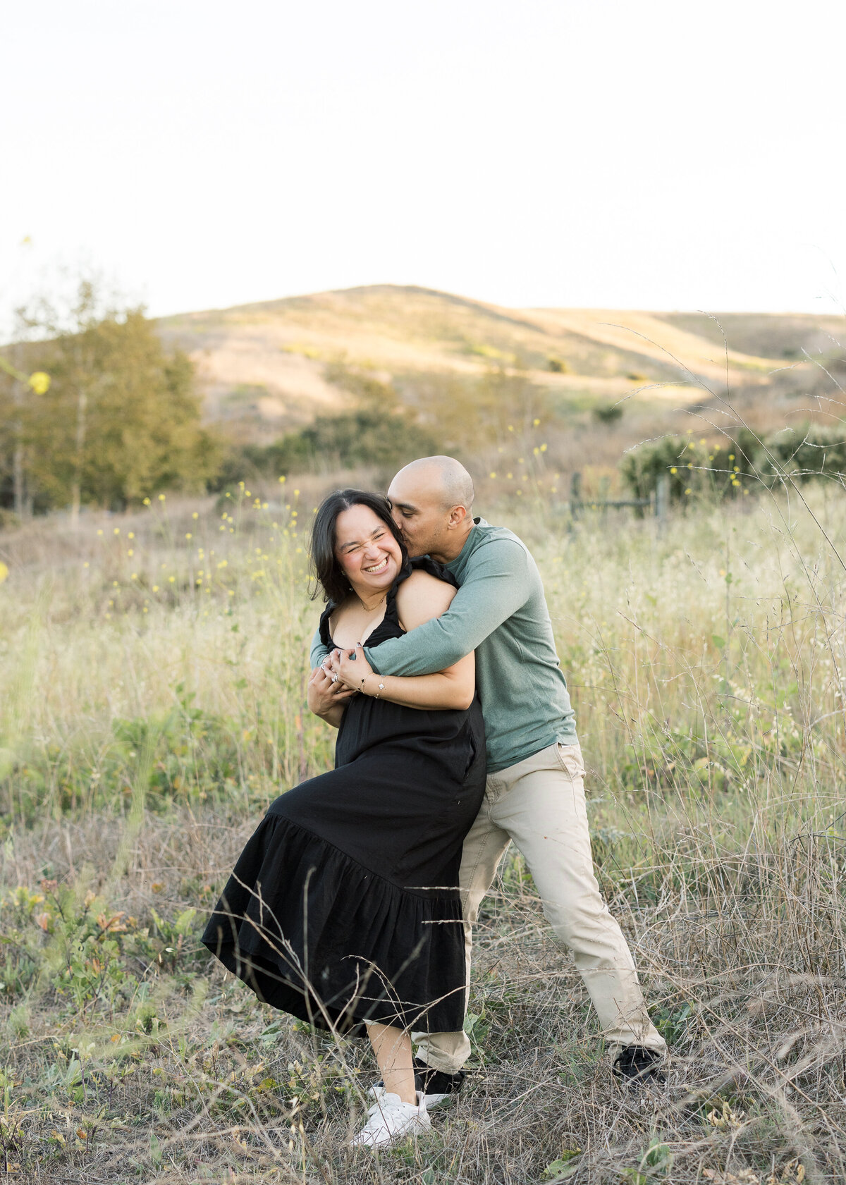 fun couple photo in open field