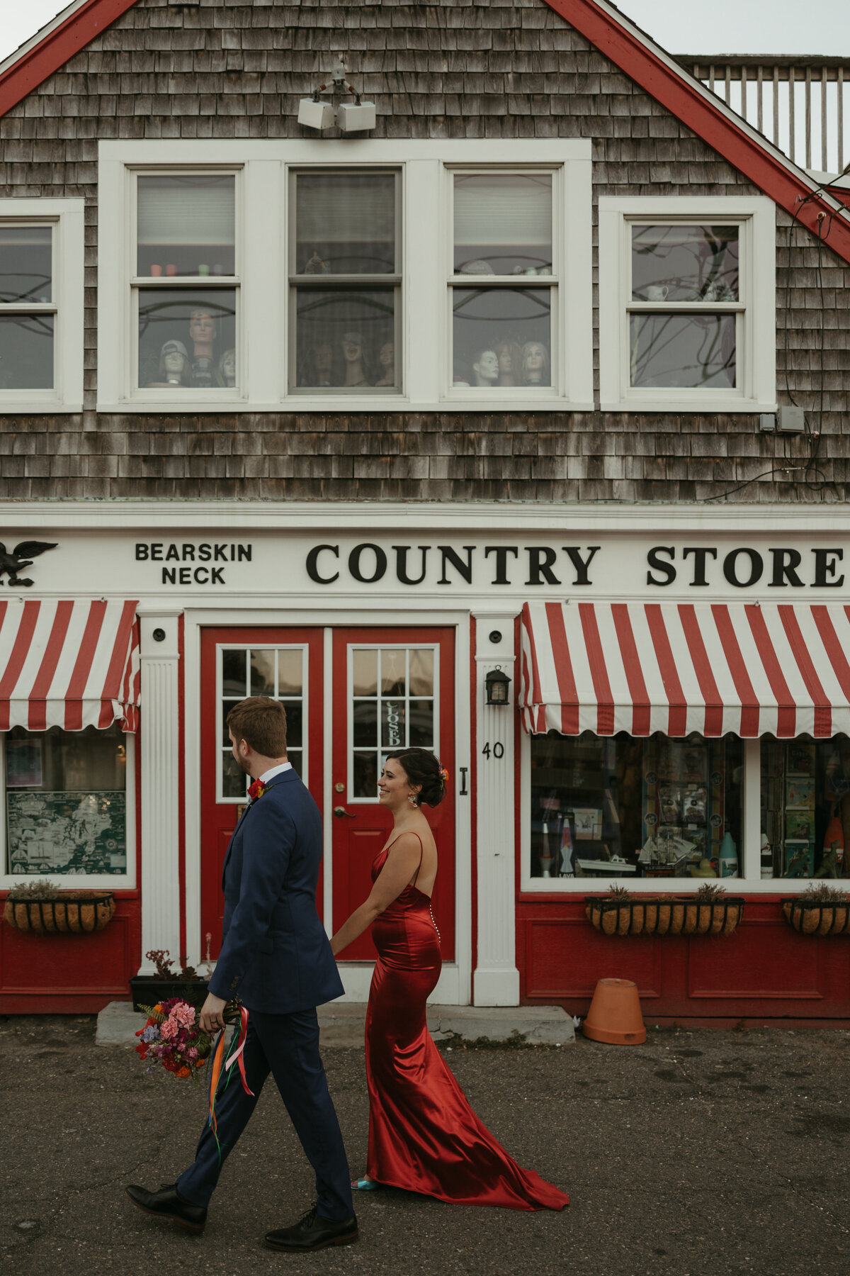 Bearskin Neck Country store with wedding couple holding Prose Florals bouquet