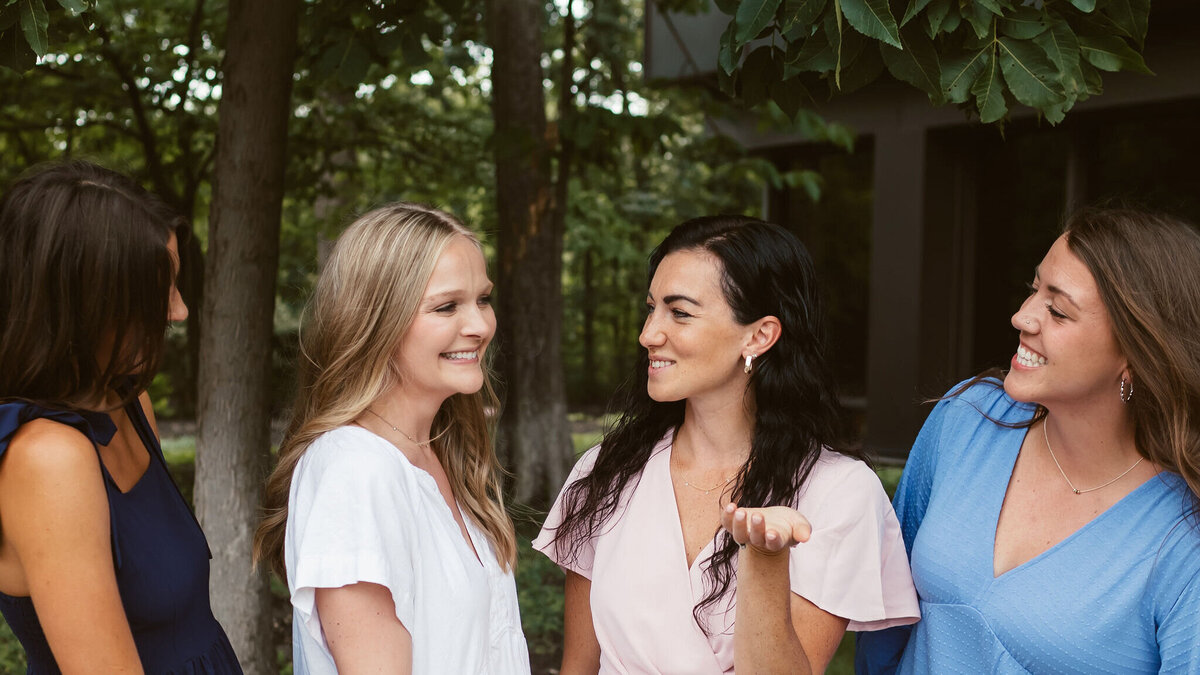 a group of women smiling