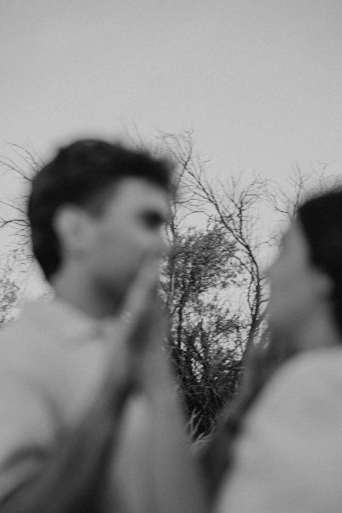 Couple's engagement session in Omaha during golden hour, surrounded by warm fall foliage – captured by Tori Nichole Photography. Authentic, romantic moments in a stunning autumnal setting, reflecting the beauty of the season and their love story.