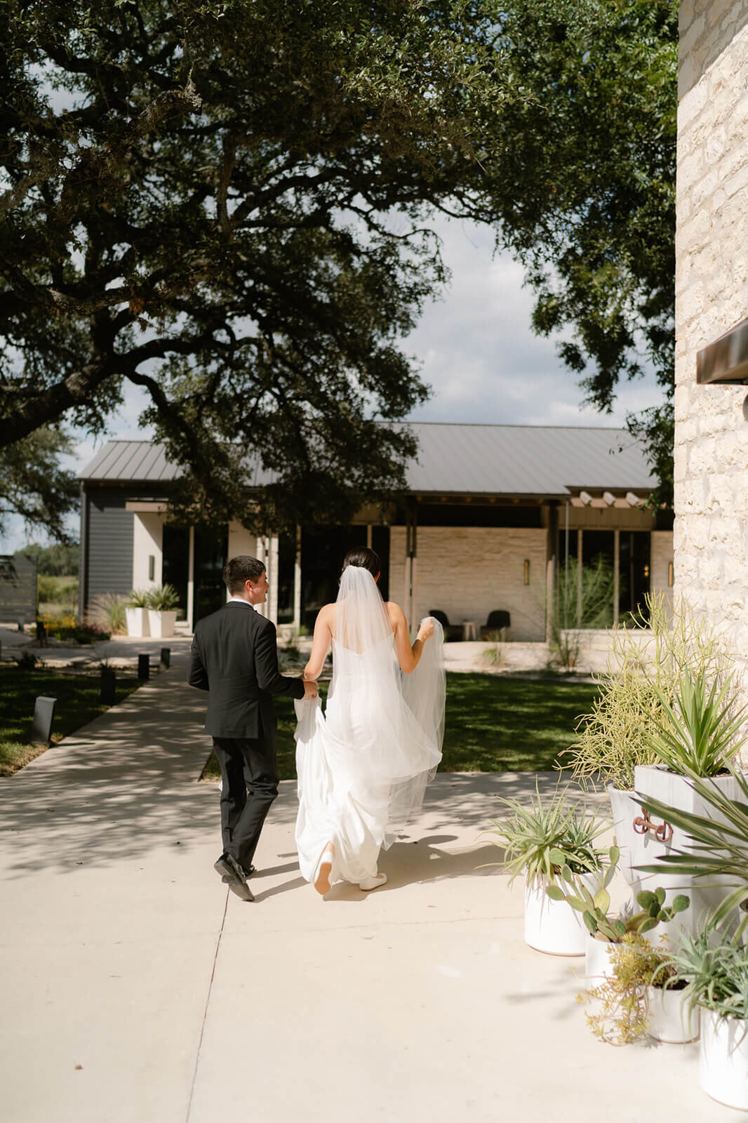 couple walking together after first look