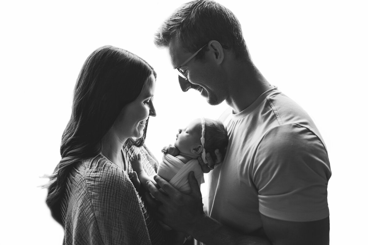 Black and white backlit image of baby girl