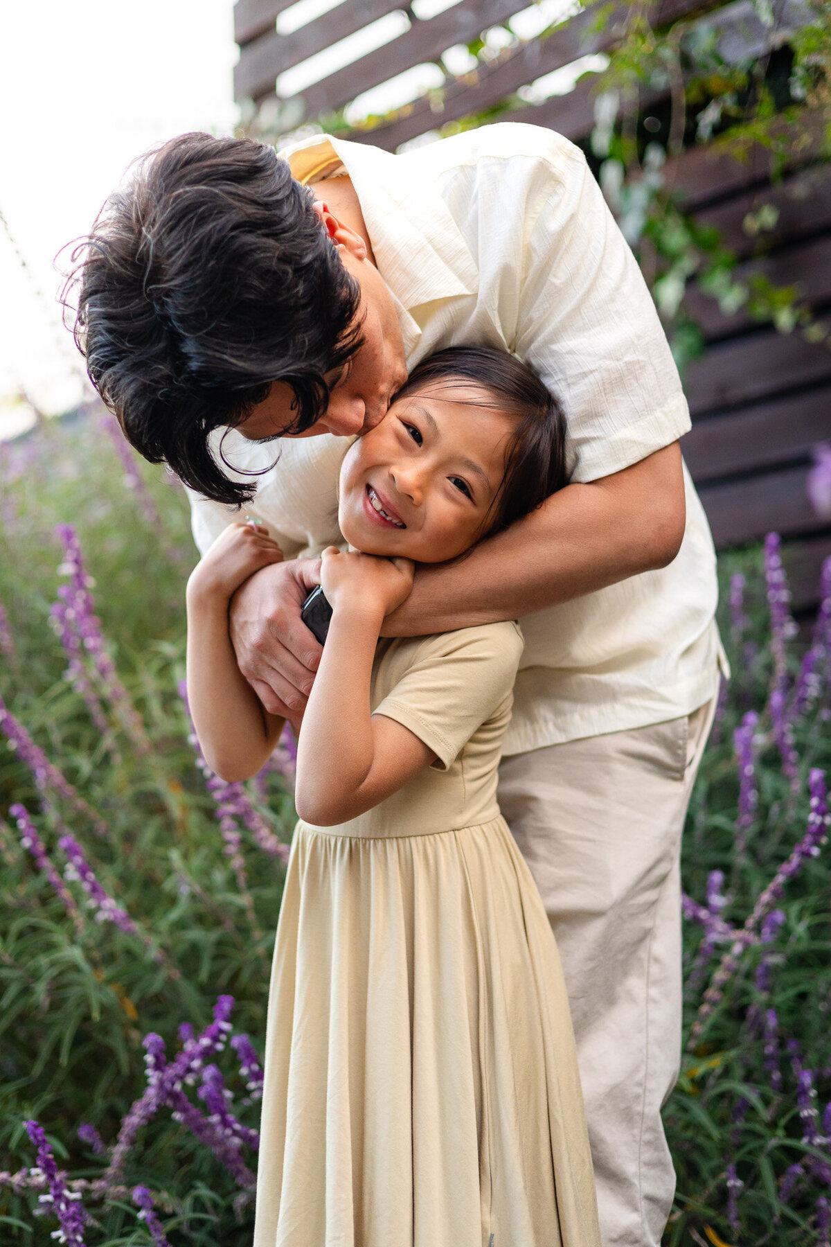 Dad gives daughter a tender kiss during outdoor family session – Bay Area Family Portfolio - Ellobelle Photography Family Photographer