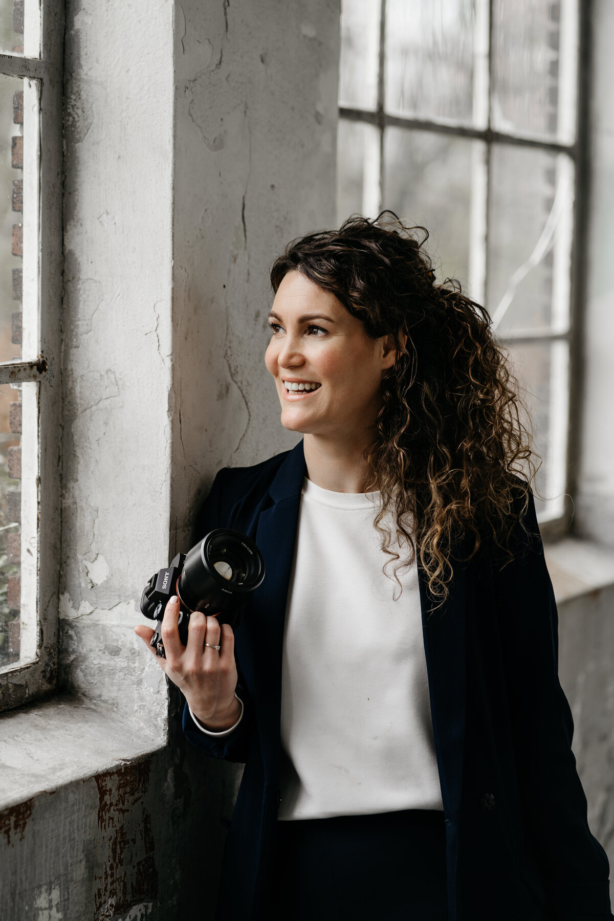 Portret foto van een fotograaf tijdens een branding shoot 