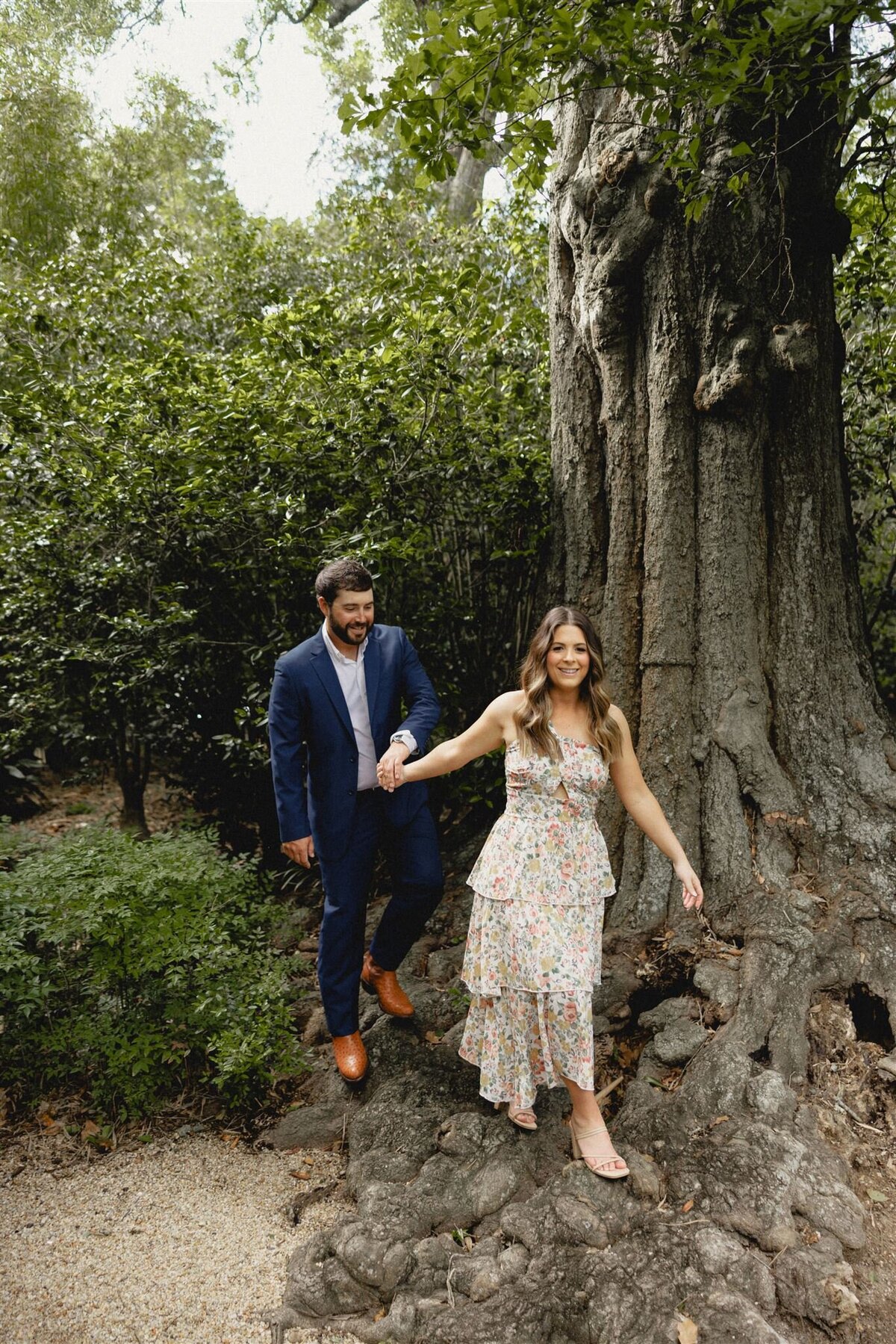 couple-walking-on-tree