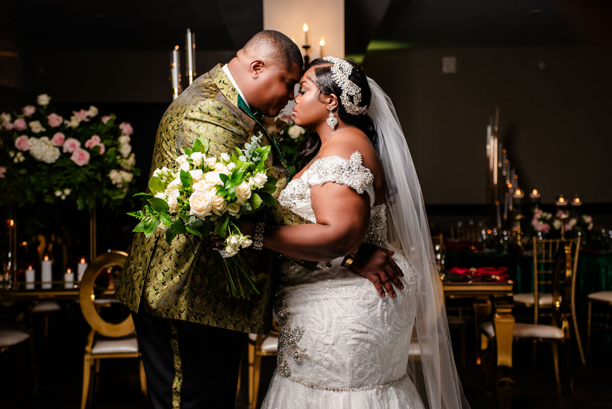 Black couple wedding at 1208 Washington decor by Couture Events, hair by Candy Forever Hair