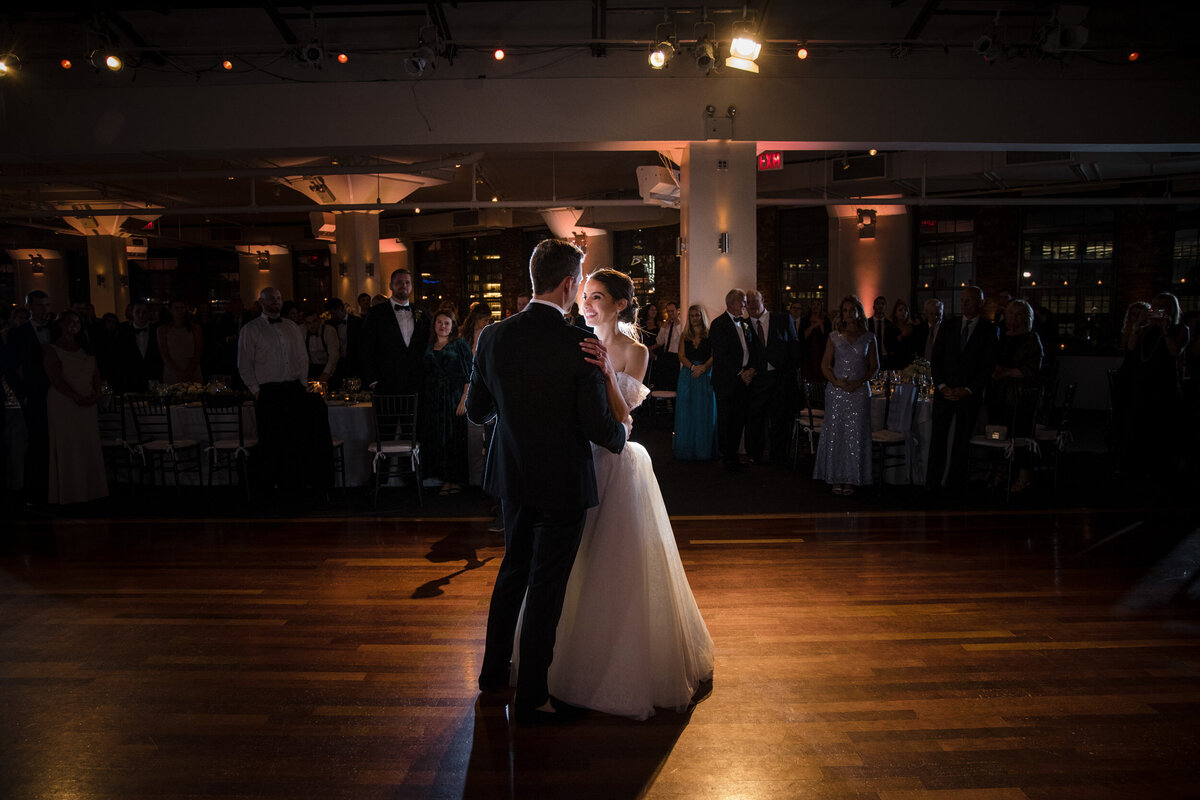 A couple share a first dance at a Tribeca Rooftop wedding in Manhattan