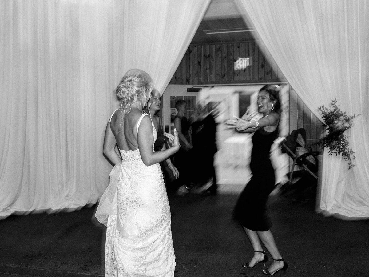 Wedding reception gets started with bride on the dancefloor