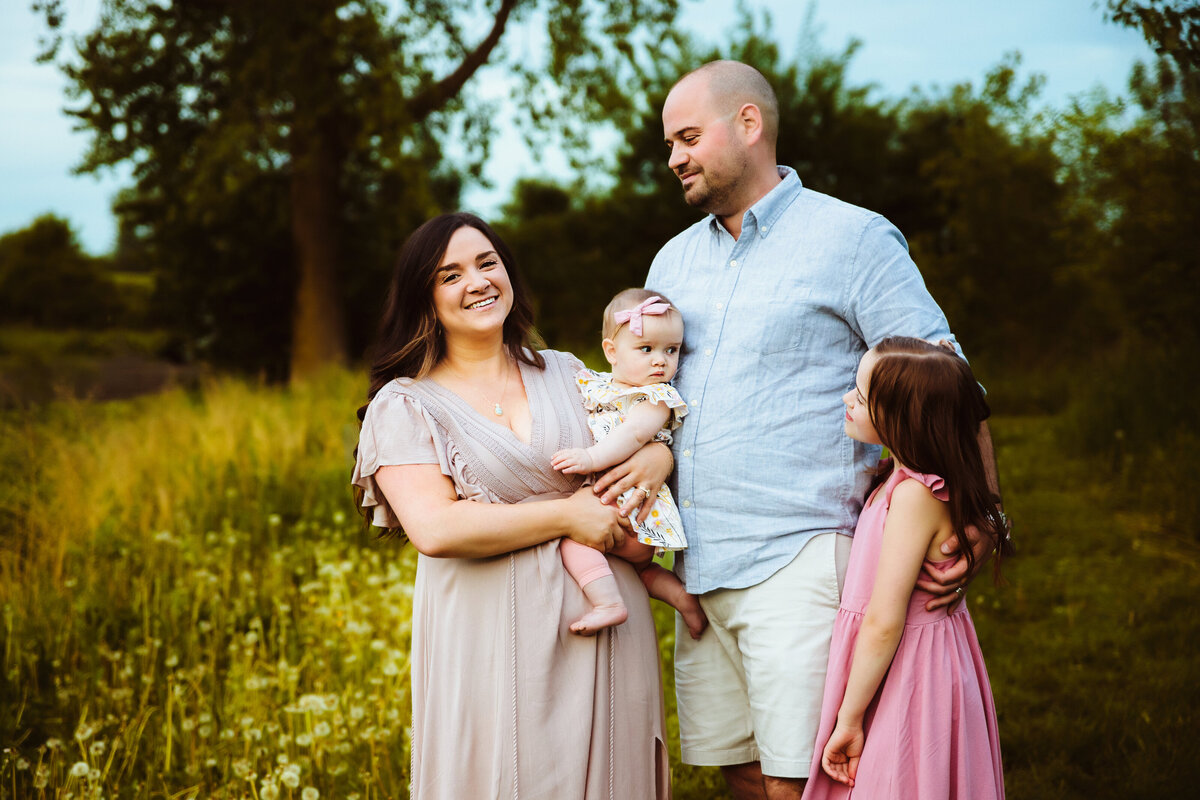 family embracing during syracuse family photography session