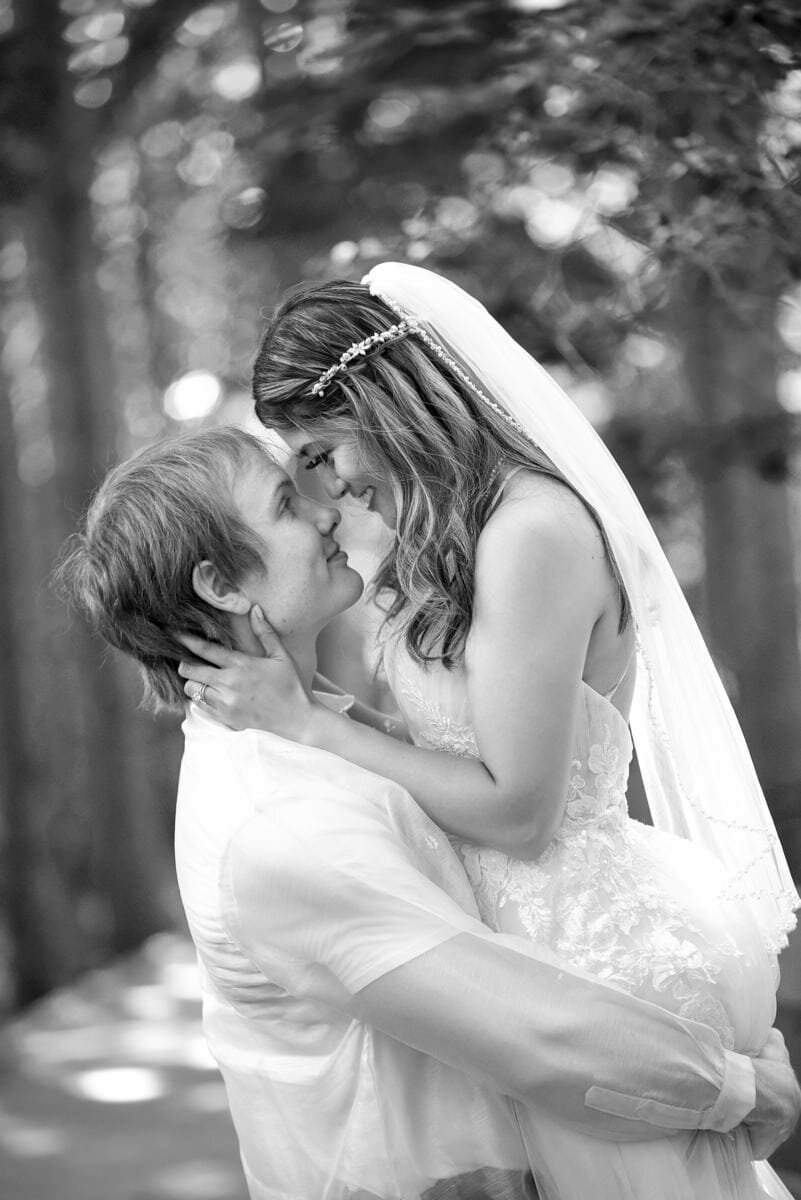 Romantic wedding couple in a forested setting