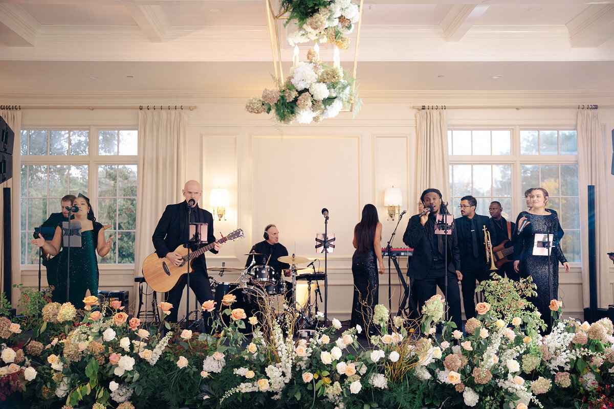 floral-stage-for-wedding-reception-at-woodway-country-club-ct
