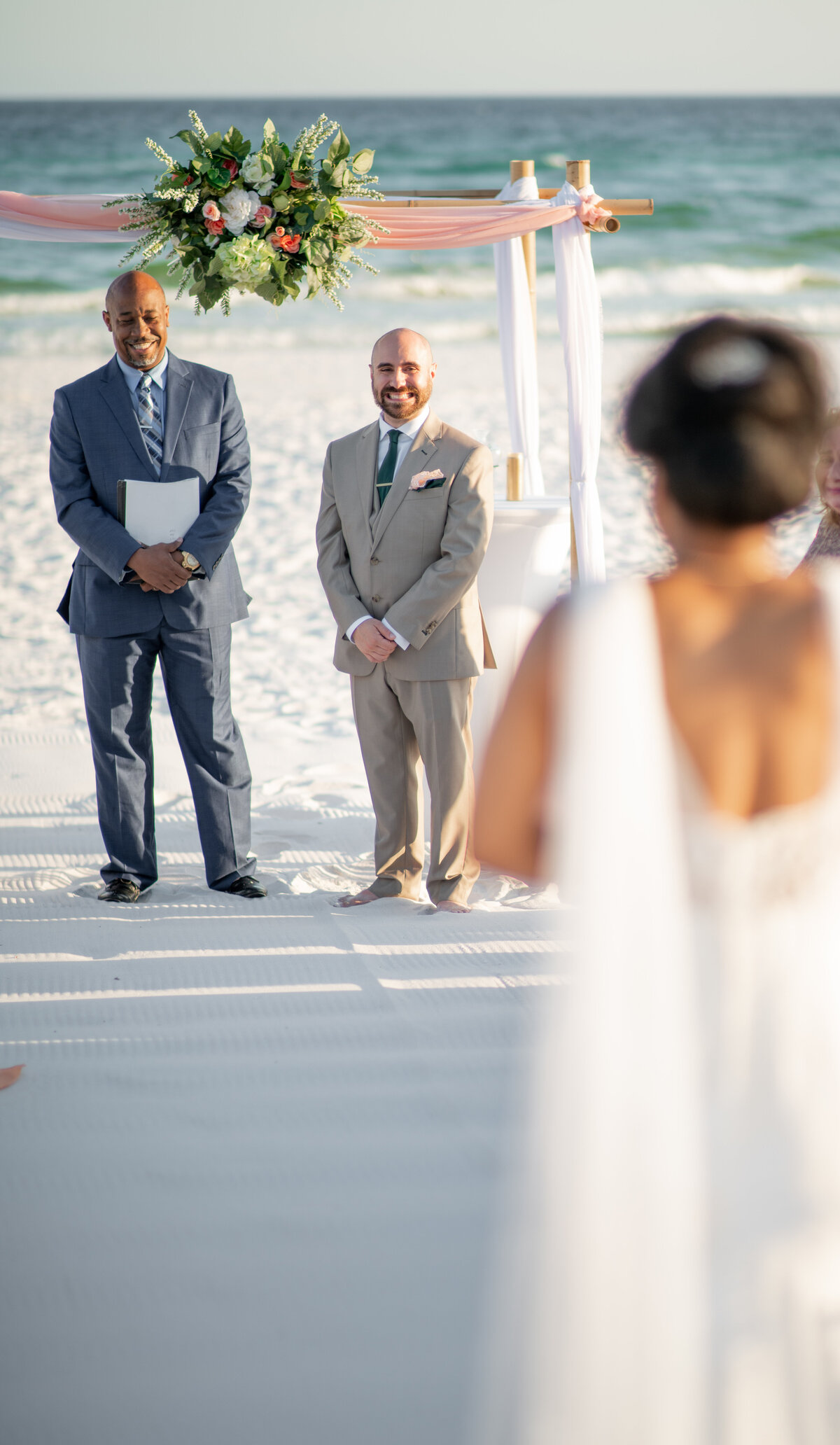 First look durig a beach wedding in fort walton Florida