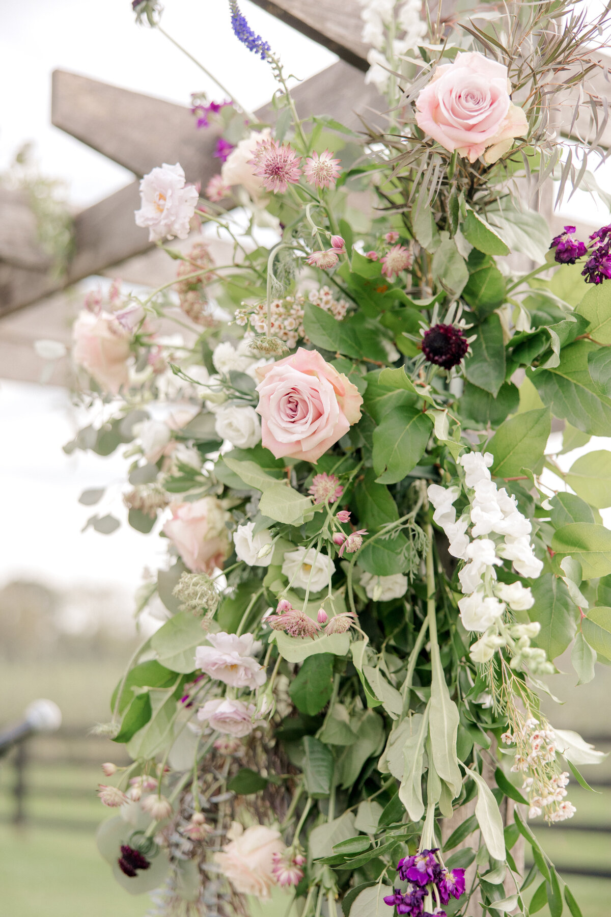 Pink and purple wedding florals for orchard wedding