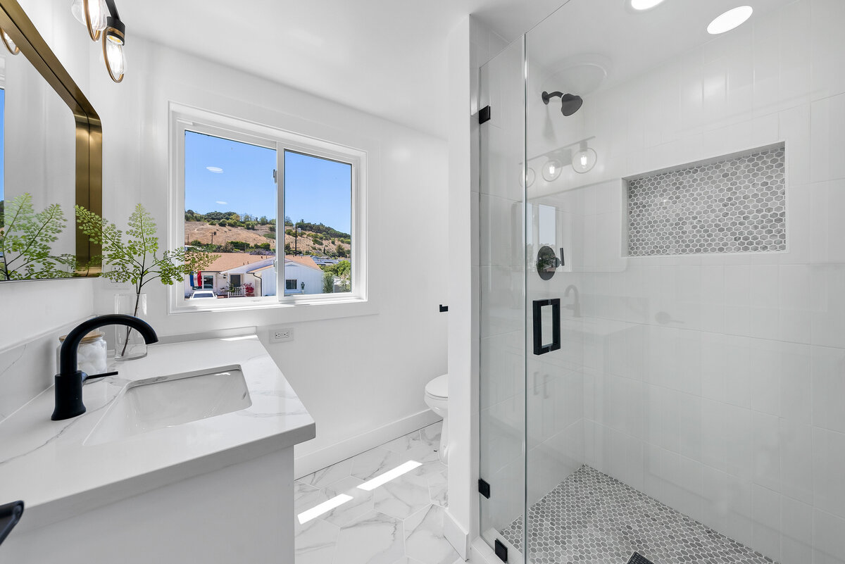 bright-white-bathroom-hill-view-large-shower-aw-development