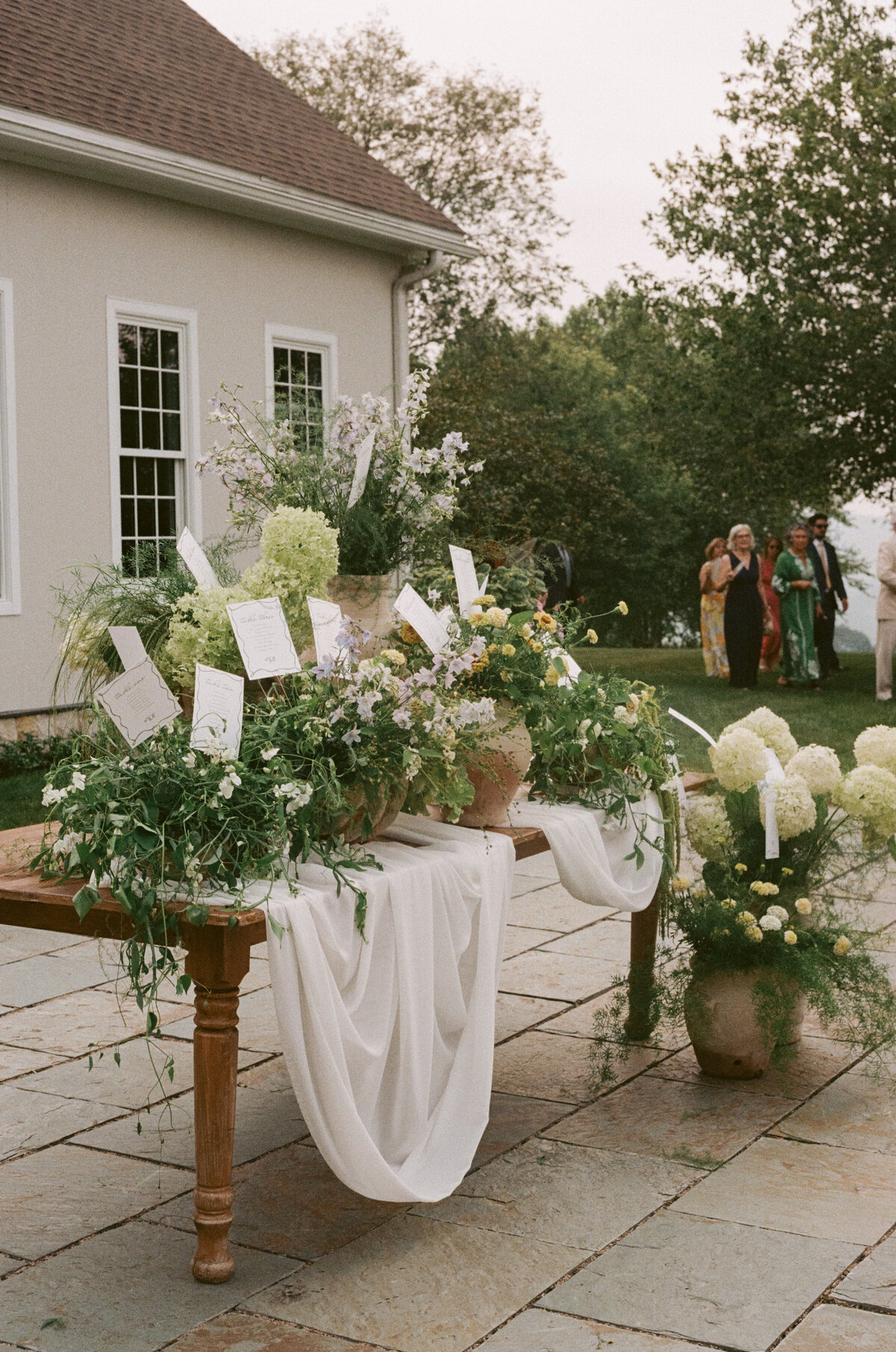 Elegant film photography portrait showcasing sophisticated wedding photography at Lion Rock Farm venue. Lauren Alatriste combines fashion photography aesthetics with authentic documentation, creating magazine-worthy celebration imagery.