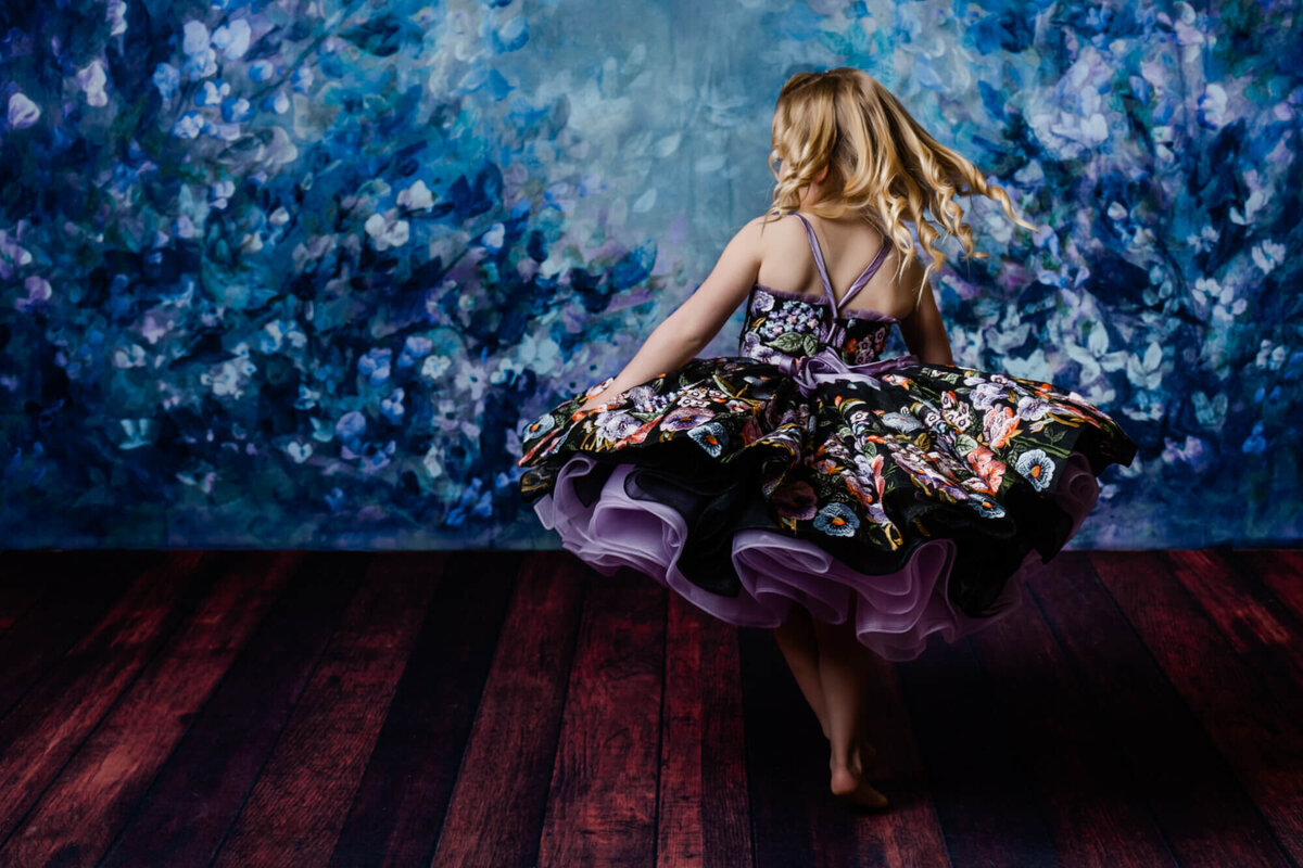 Young girl dances in dream dress session by Prescott kids photographer Melissa Byrne