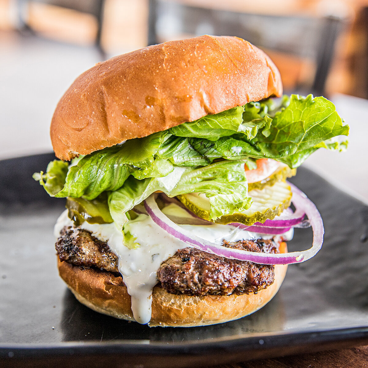 juicy lamb burger photographed by nancy ingersoll in north park neighborhood of san diego