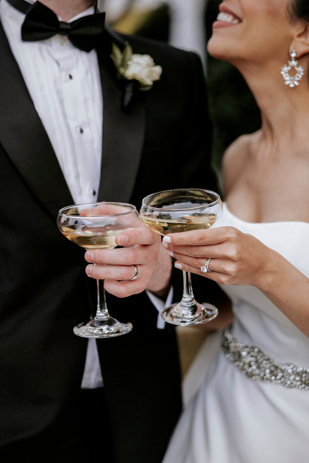 married-couple-toasting-champagne-coupes