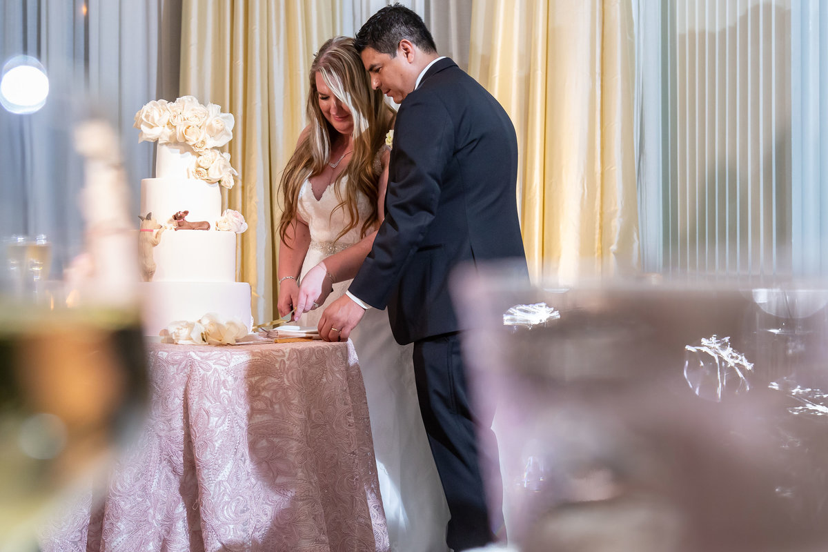 Bride and Groom cutting their cake