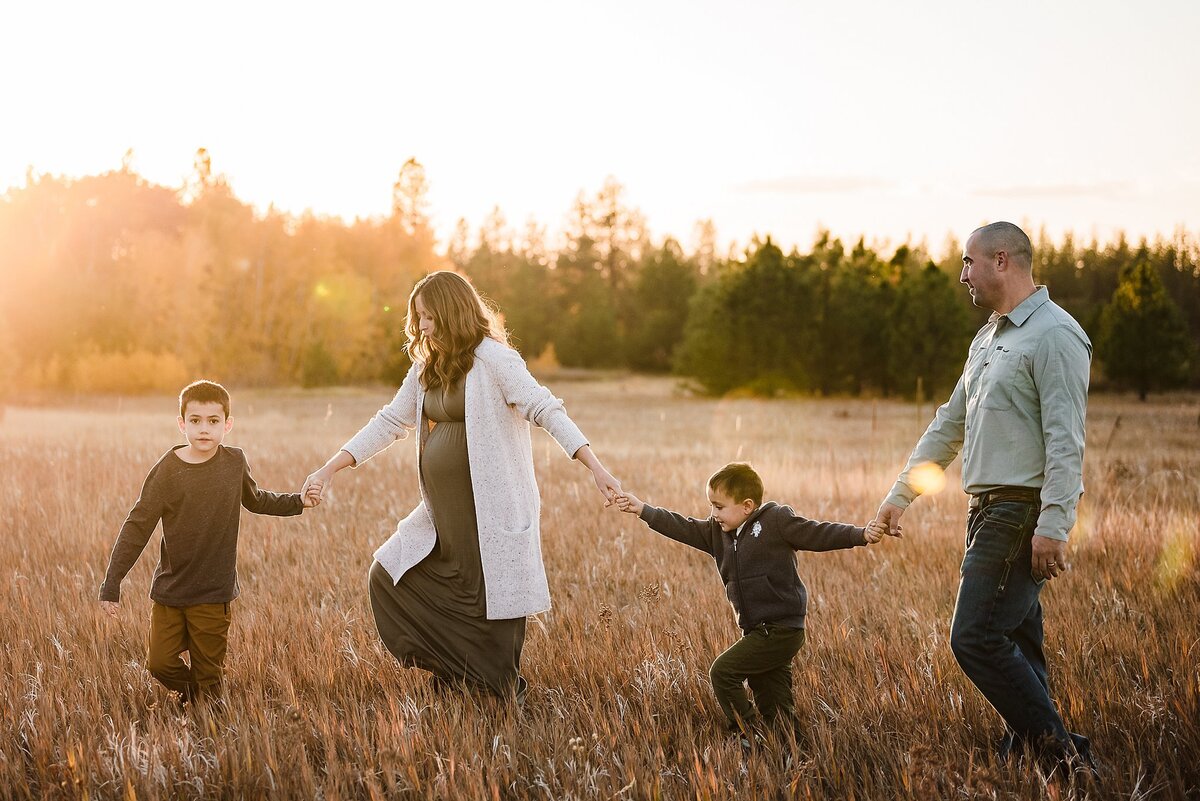 fall maternity family photos in field Slavin Conservation area spokane county