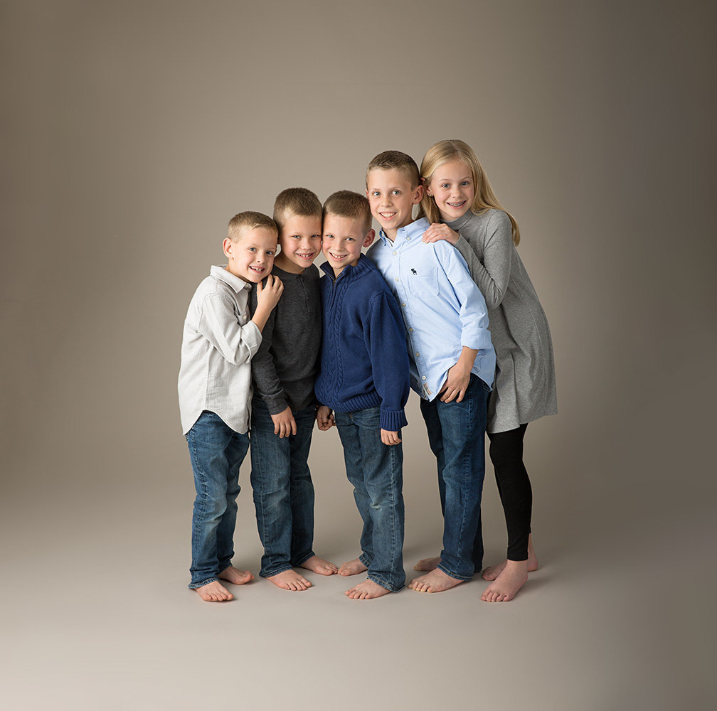 Siblings standing together