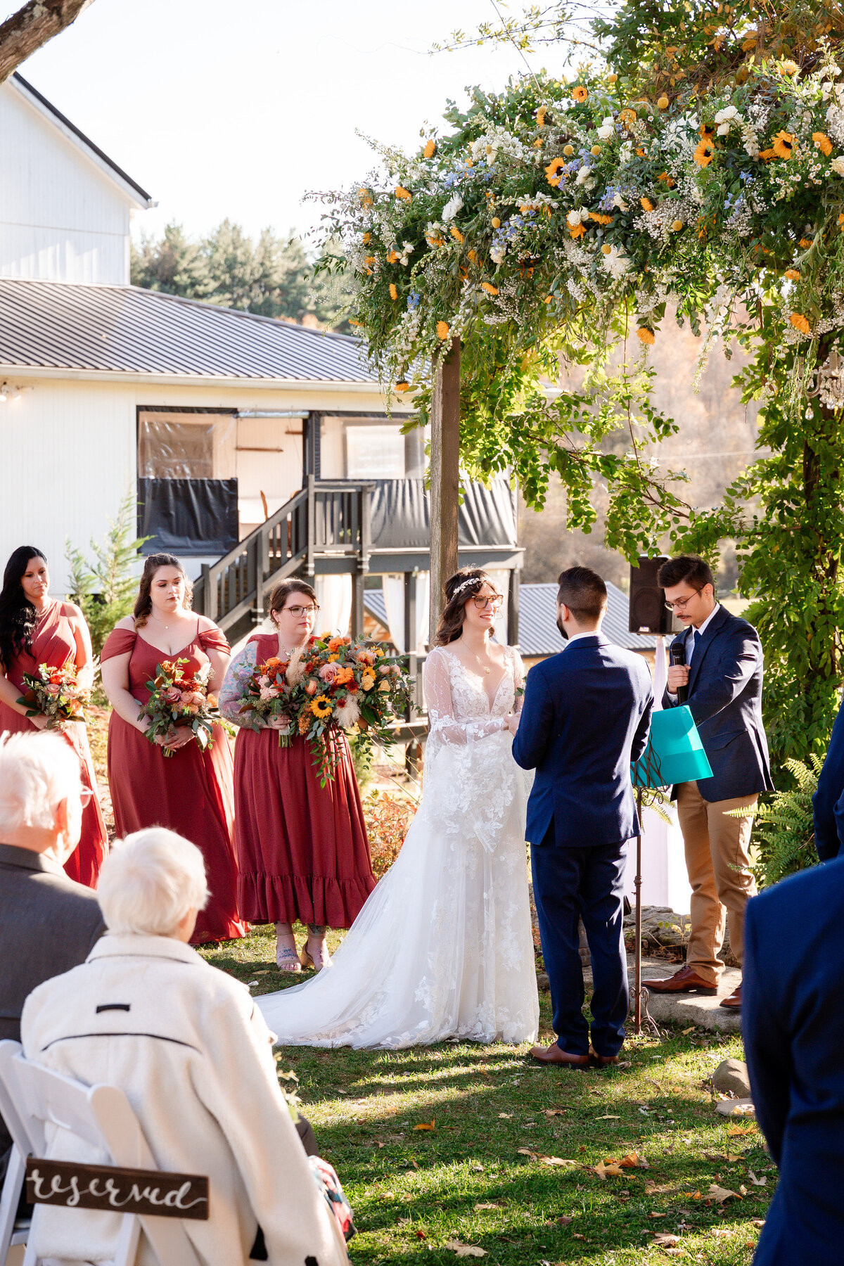outdoor wedding ceremony in october at shady elms farm