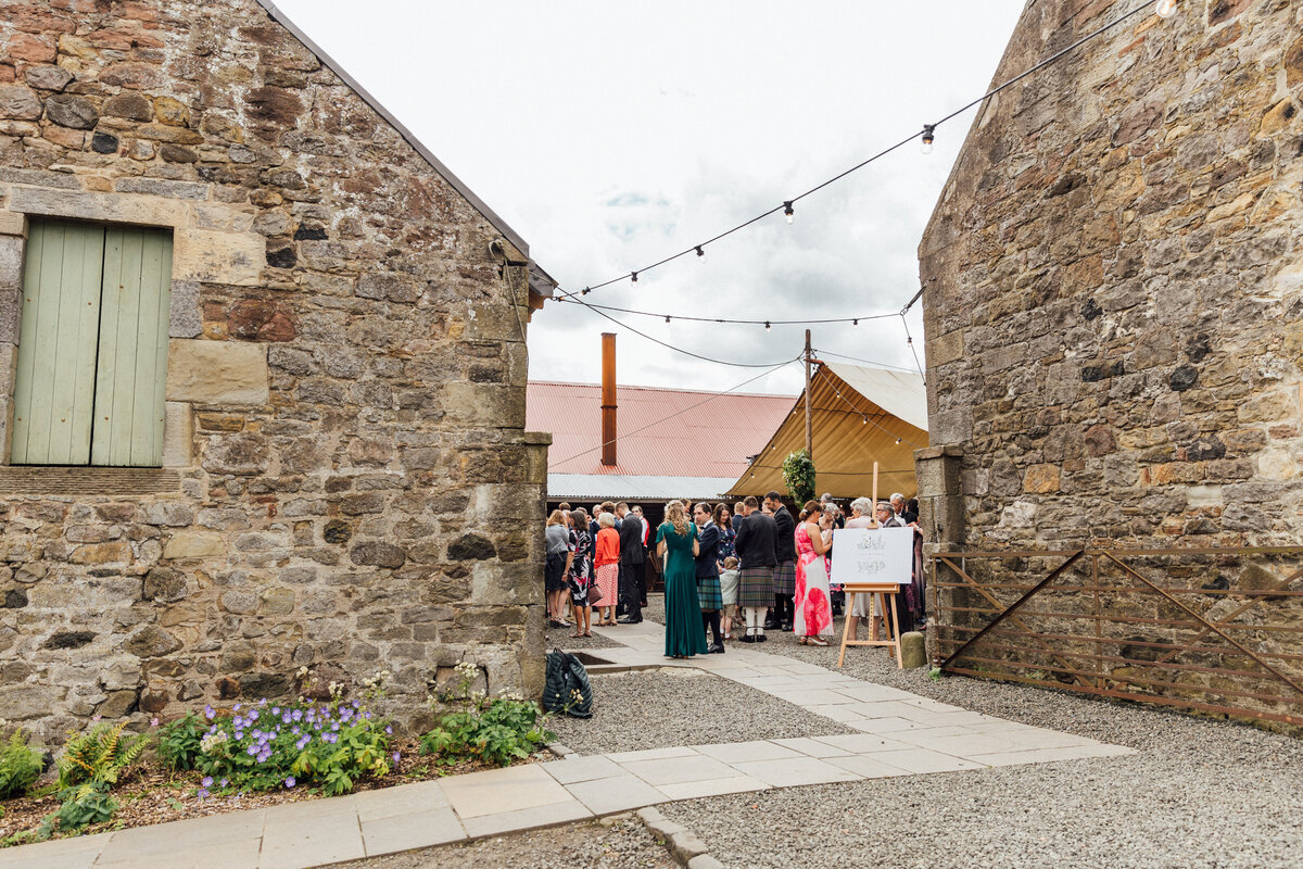 Guests mingling at The Free Company wedding