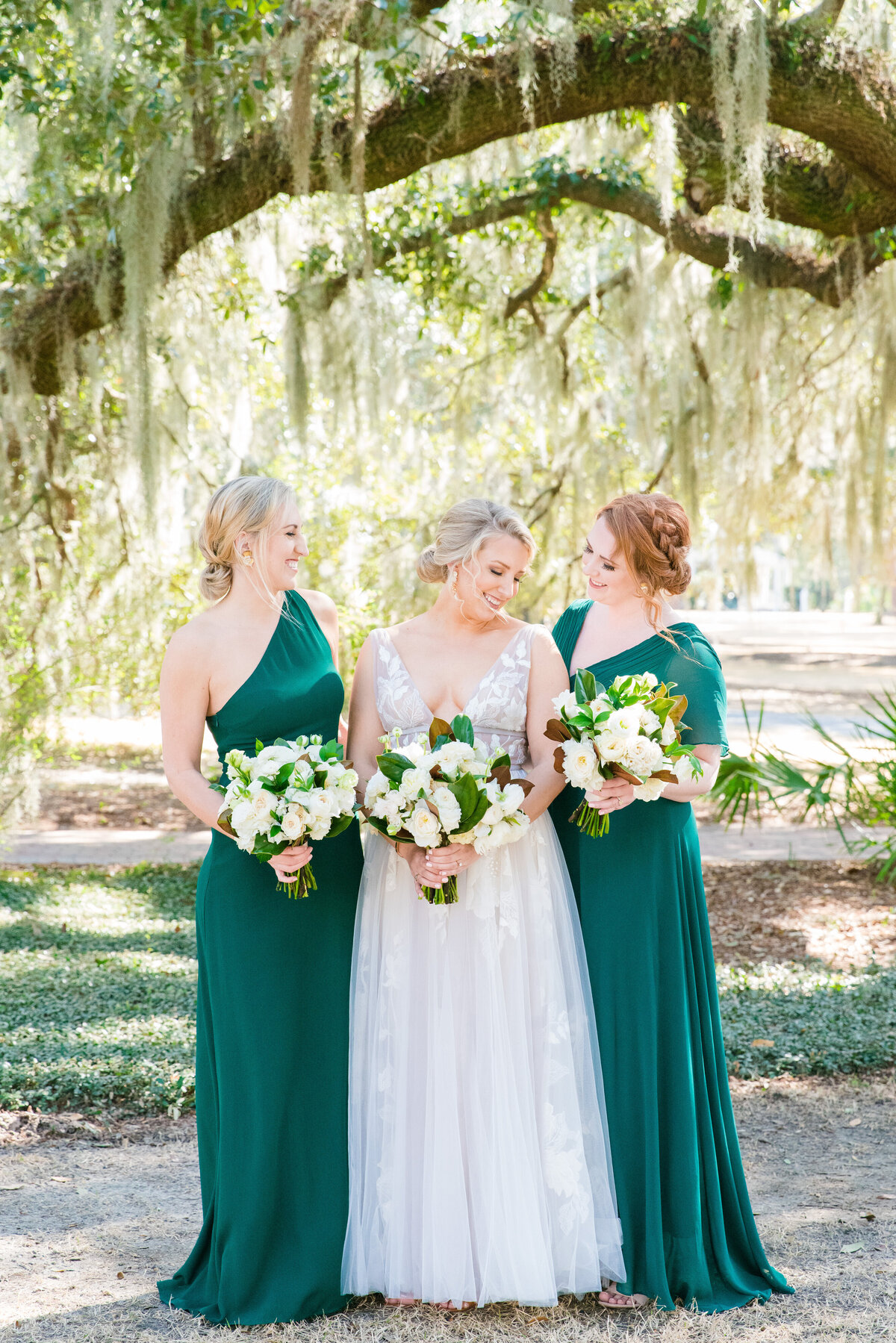 Bride with bridesmaids before her Veuve-inspired wedding at Palmetto Bluff in Charleston, SC. Photographed by Charleston Wedding Photographer Dana Cubbage.