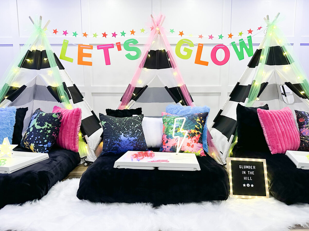 three teepee beds with glow in the dark decor