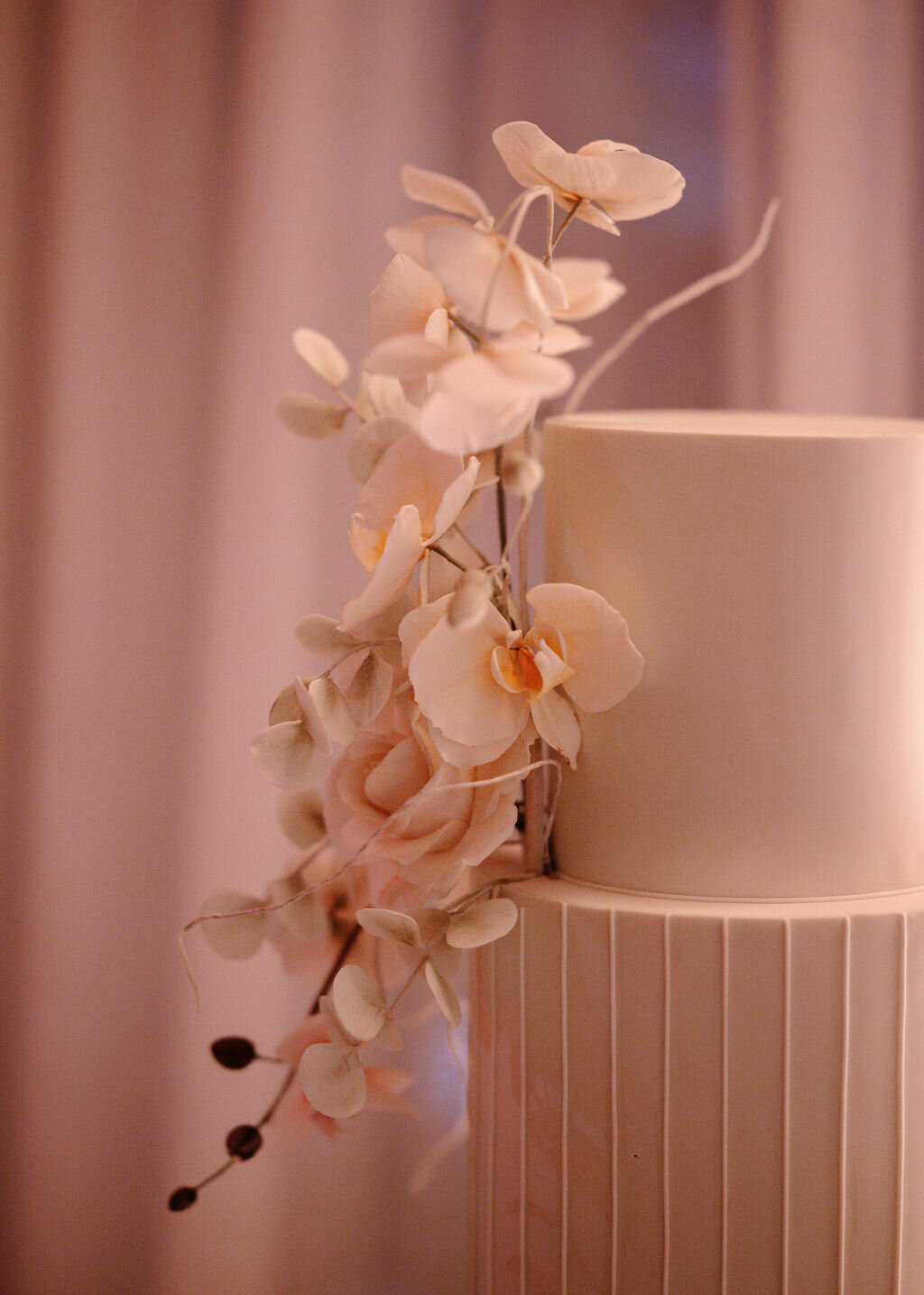 Orchid and rose wedding cake by Daniel Colonel at Public Hotel in NYC