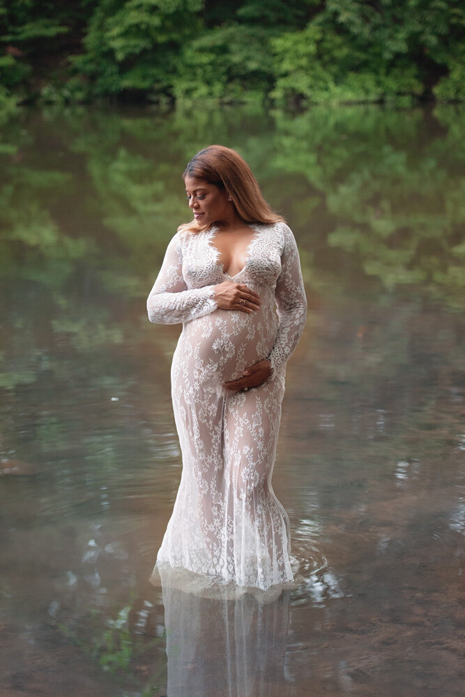 Maternity session with woman in water
