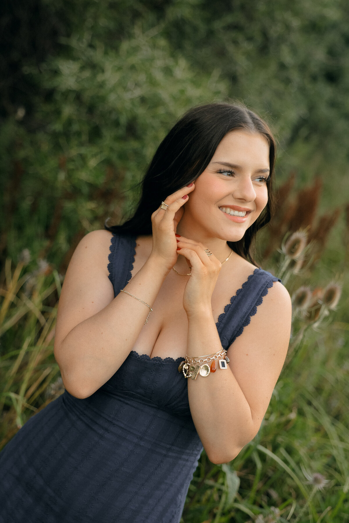 Dreamy Editorial Senior Portrait Looking Toward the Sky in Open Field