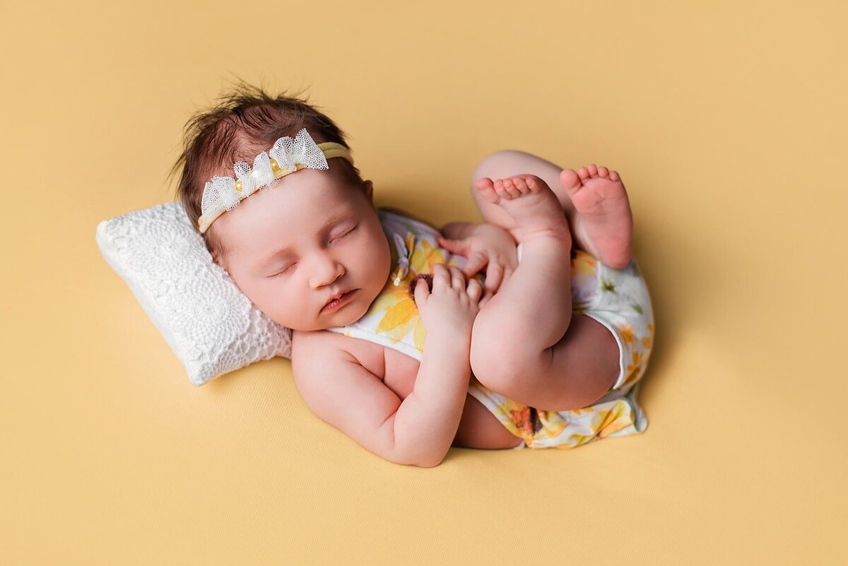 mobile-in-home-newborn-photography-vancouver-fraser-valley_baby-girl-yellow-sunflower-blanket-pose