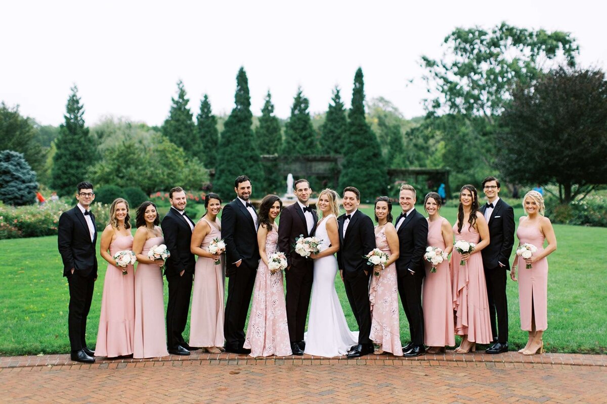 Modern and romantic wedding party look at a luxury Chicago outdoor garden wedding.