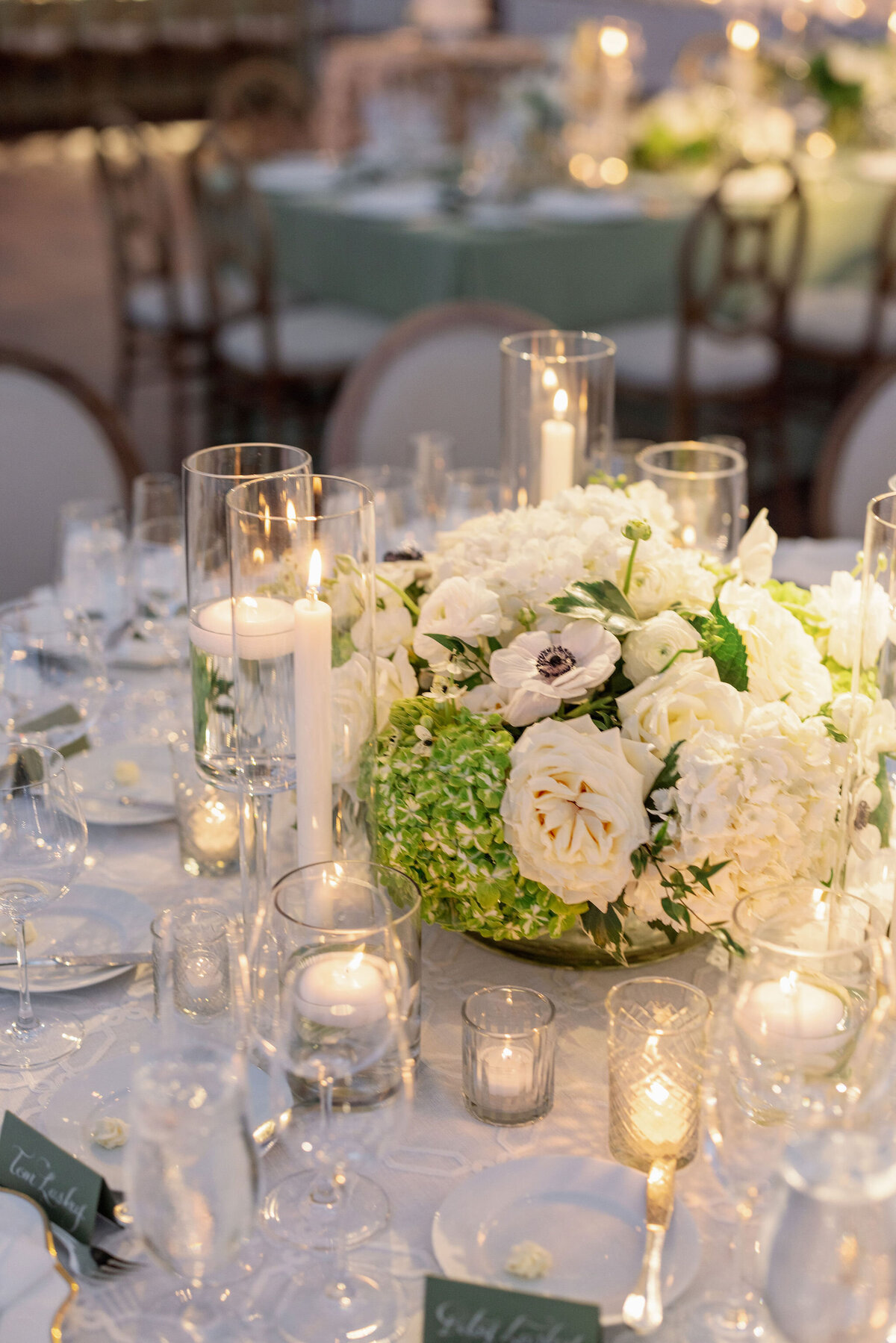 Close up of the floral arrangements on the tables at the wedding. 