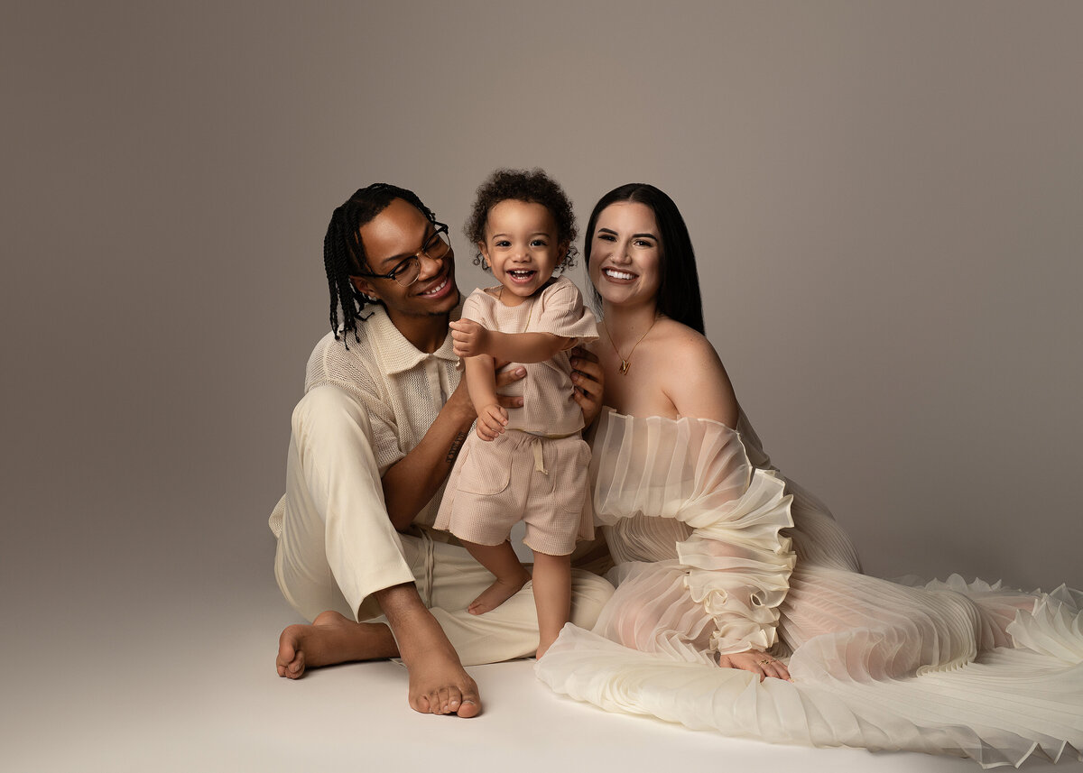 Syracuse photographer, baby, gowns, photoshoot, photography, backdrop, studio, glam, family, family of three, son