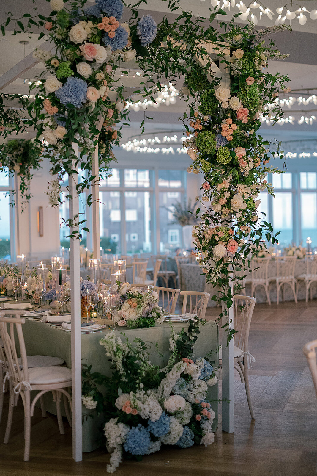 Kate_Murtaugh_Events_Cape_Cod_wedding_planner_reception_headtable_overhead_trellis
