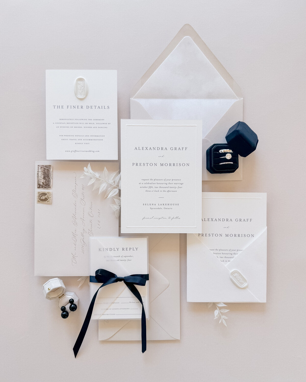 Minimalist wedding invitation suite with mixed textures and embossed details