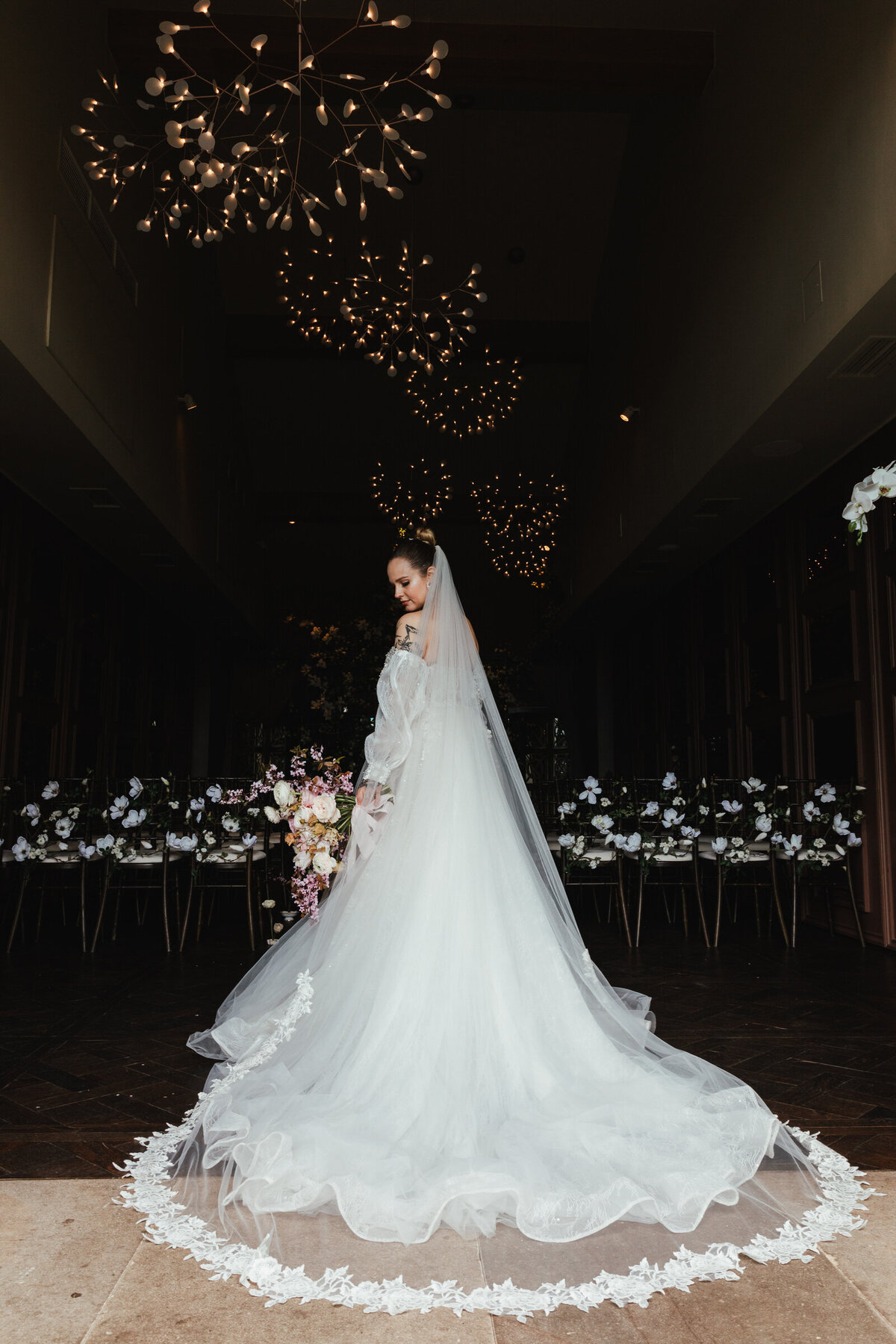 Bride at Manor House Lindley with beautiful long veil