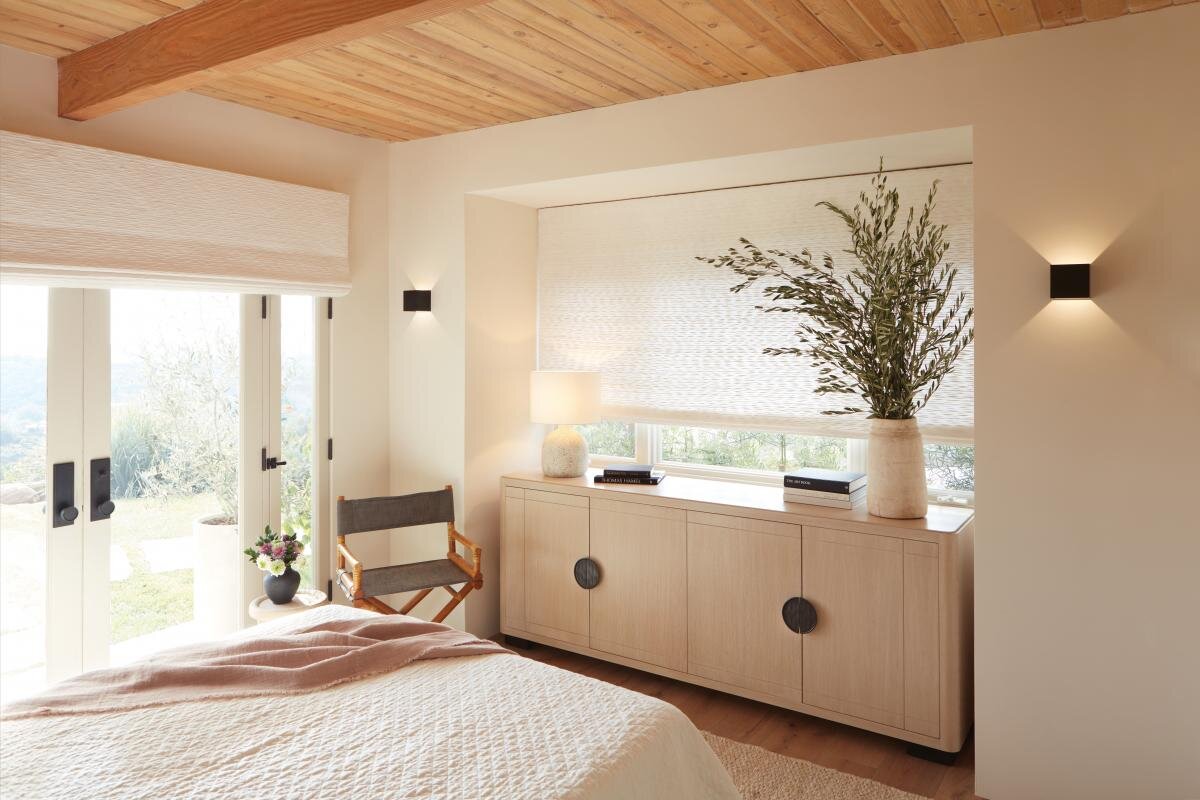 Custom window treatments in a cozy bedroom