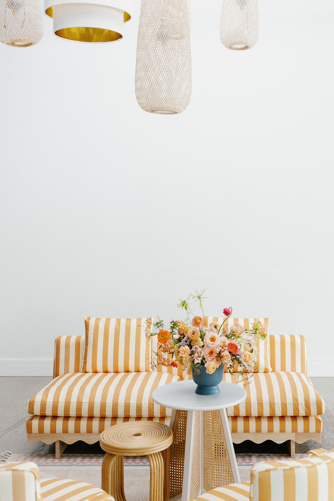 striped furniture and flowers