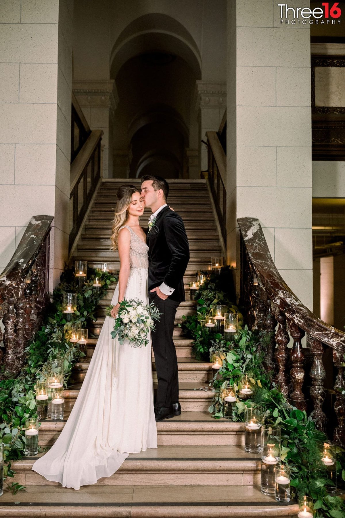 Beautifully designed stairwell with Bride and Groom