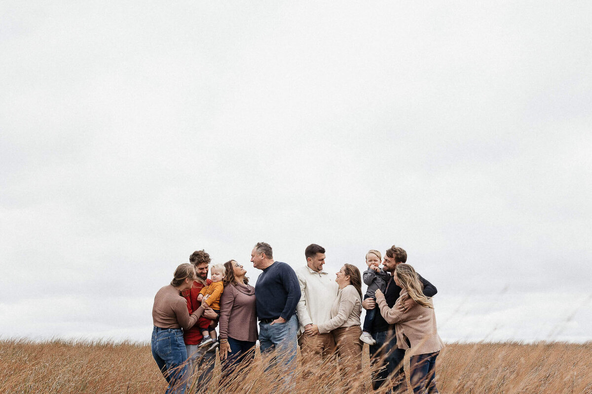 Extended family photography at Headlands Beach in Mentor, Ohio. Large candid family photo.