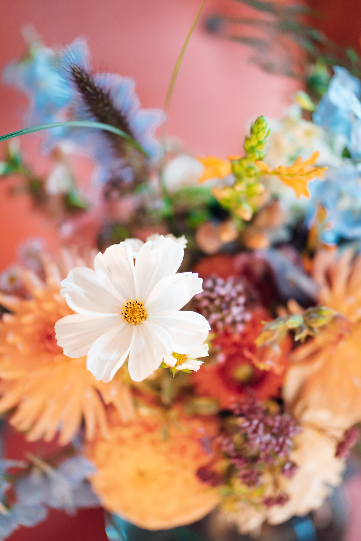 Gloucestershire-wedding-photographer-colourful-bridal-bouquet-at-pauntley-court