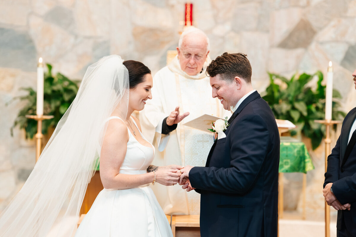 Bride and groom portraits at Castleton in Windham NH with beautiful lake views.